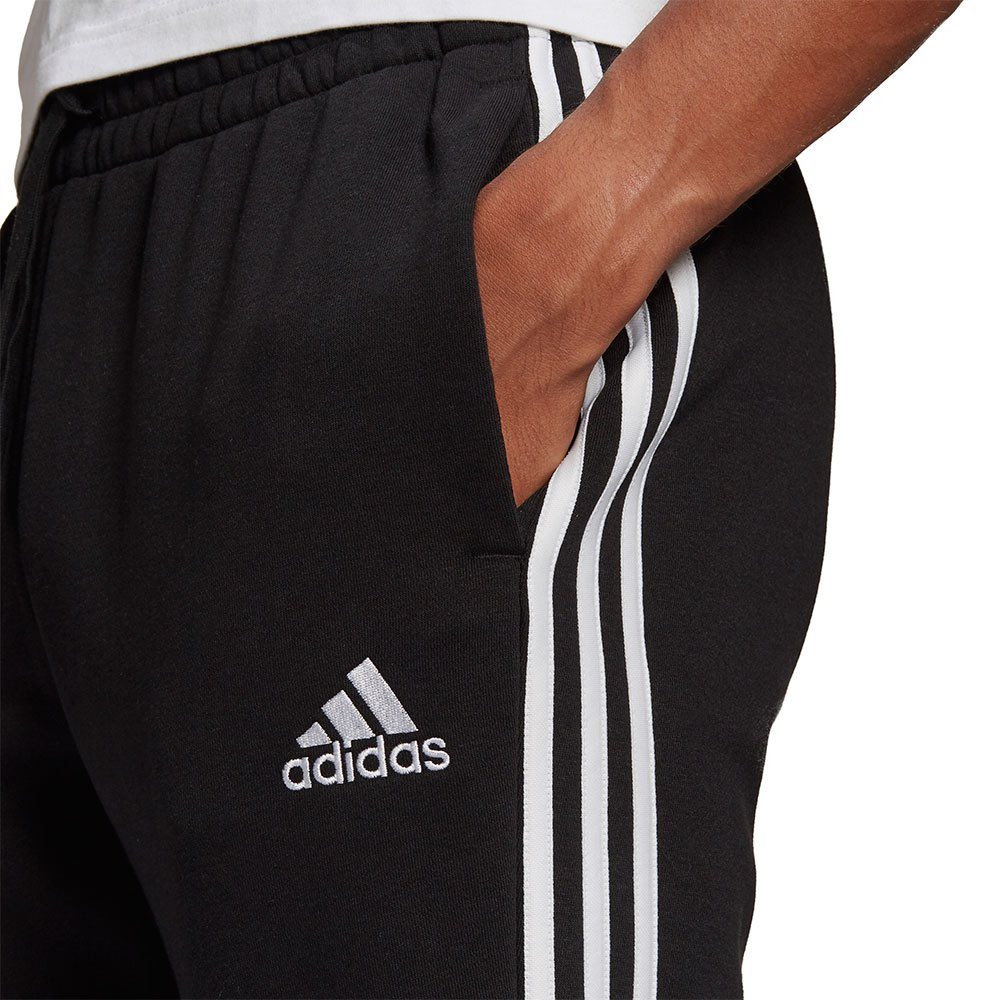 adidas Essentials Fleece Tapered Cuff 3-Stripes pants